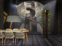 Spiral staircase mural with earthy tones, dark walls, and a plaid-patterned carpet in neutral colors.
