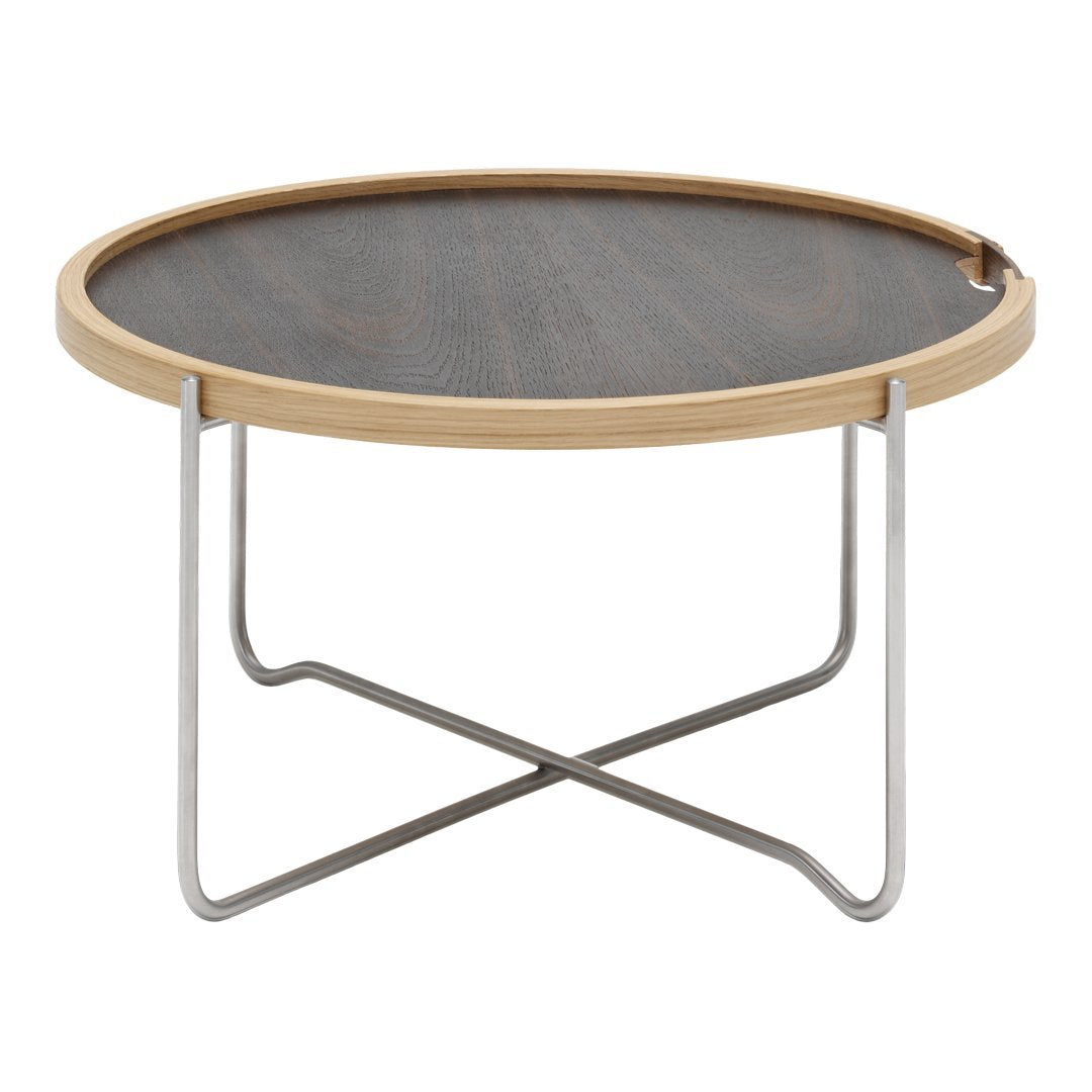 Round coffee table with a dark wood surface, light wooden rim, and silver metal legs, showcasing a modern minimalist design.