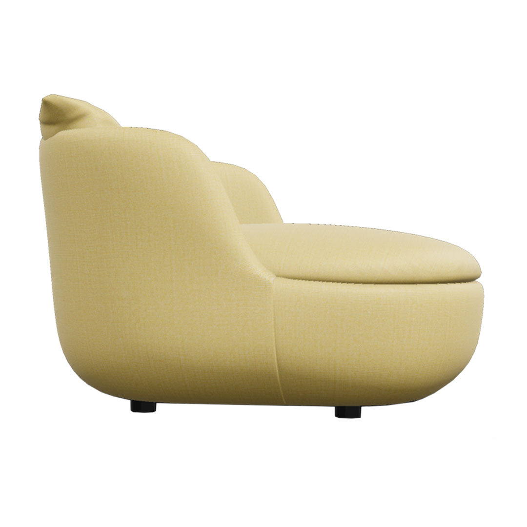 Soft, curved sofa in a light yellow fabric with a smooth texture and minimalist design. Perfect for modern decor.