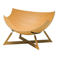 Stylish light wood chair featuring smooth, curved lines with a sleek, minimalist design and a warm, natural finish.