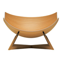 Curved wooden chair in a warm honey tone with smooth, sleek lines and minimalist design. Perfect for modern decor.