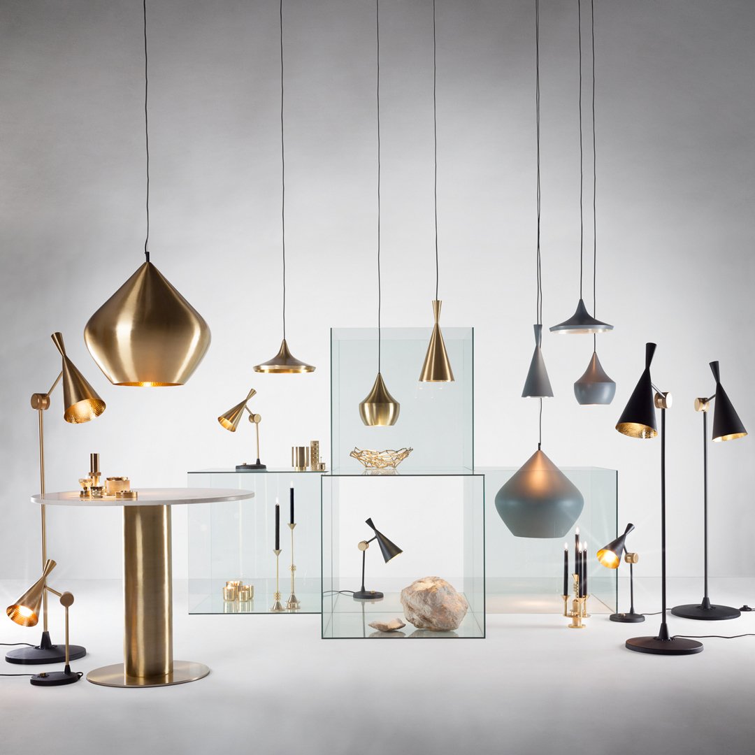 Stylish lighting fixtures featuring gold, black, and grey finishes, showcasing modern design and elegant patterns.