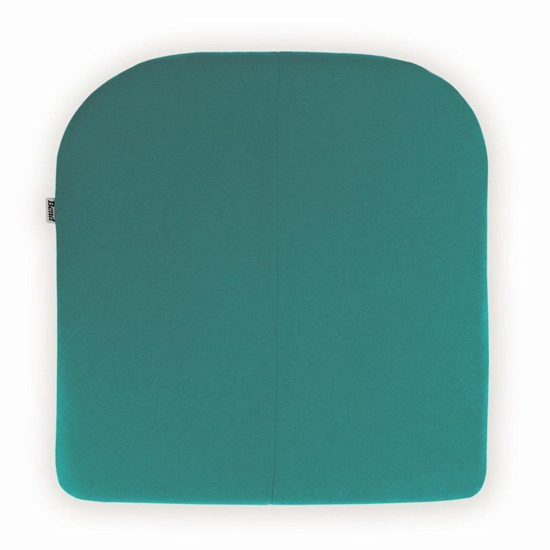 Teal square cushion with a smooth, solid texture and rounded edges, ideal for home decor.