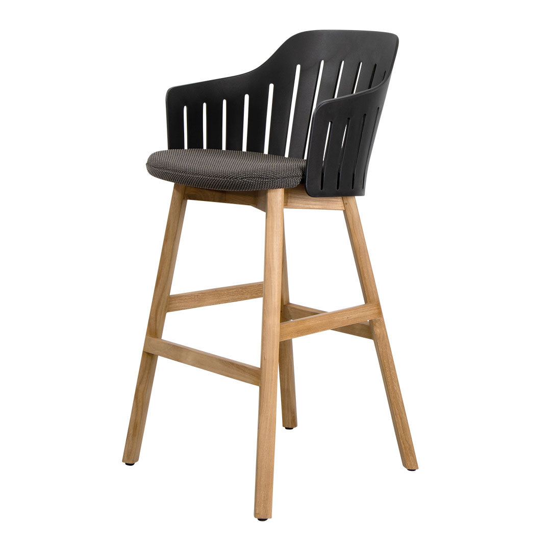 Black slatted high chair with a gray cushion and natural wood legs, offering a modern, stylish look.