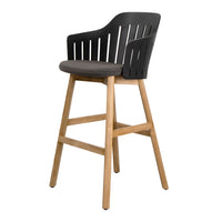 Black slatted high chair with a gray cushion and natural wood legs, offering a modern, stylish look.