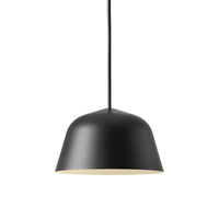 Matte black pendant lamp with a smooth finish and a subtle gold interior, perfect for modern decor.