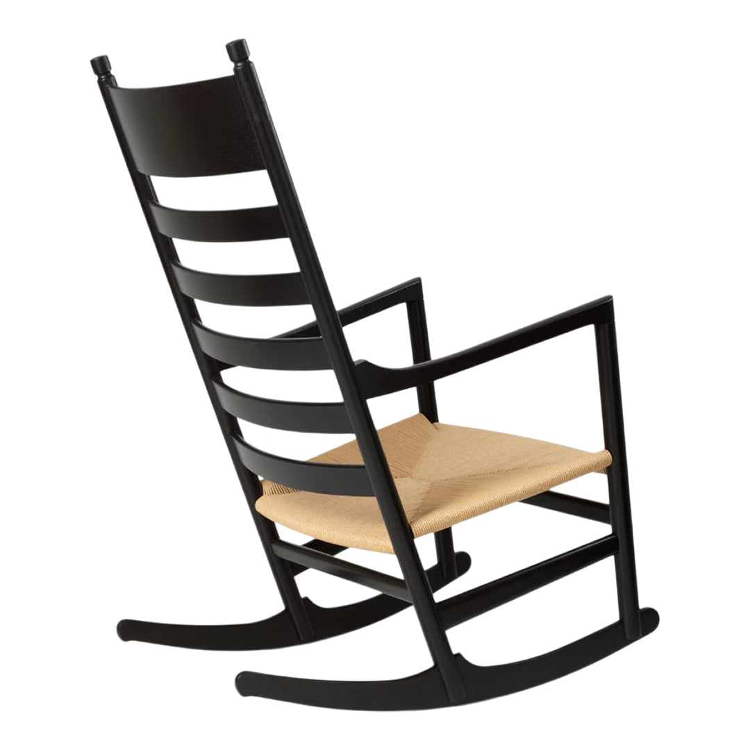 Black wooden rocking chair with a minimalist design and a natural wooden seat, featuring sleek lines and a slatted back.