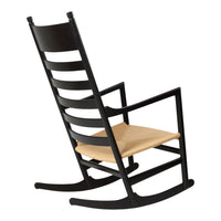 Black wooden rocking chair with a minimalist design and a natural wooden seat, featuring sleek lines and a slatted back.