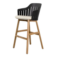 Black and beige high chair with a slatted back and natural wood legs, featuring a simple and modern design.