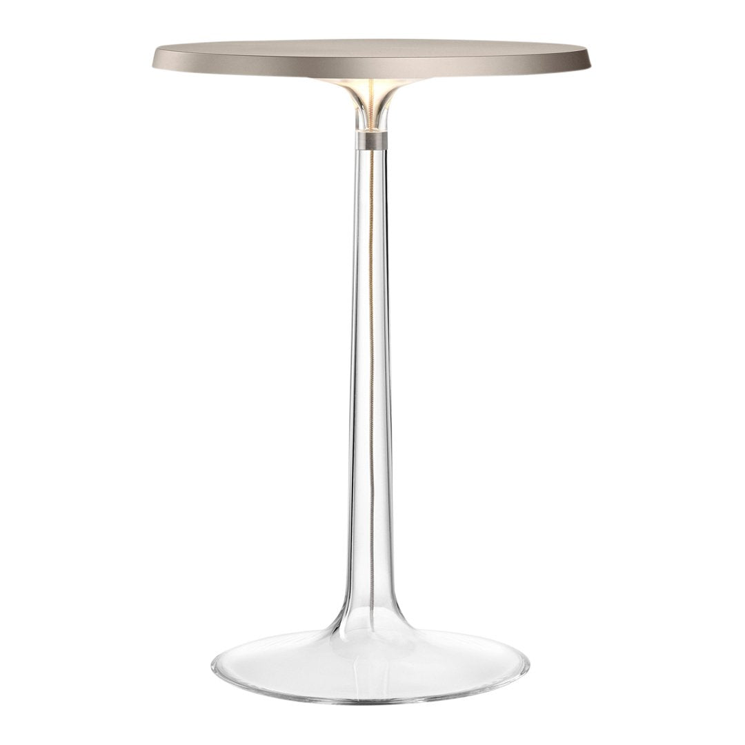 Modern clear acrylic table with a sleek metallic silver top, showcasing minimalist design and elegant simplicity.