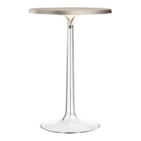 Modern clear acrylic table with a sleek metallic silver top, showcasing minimalist design and elegant simplicity.