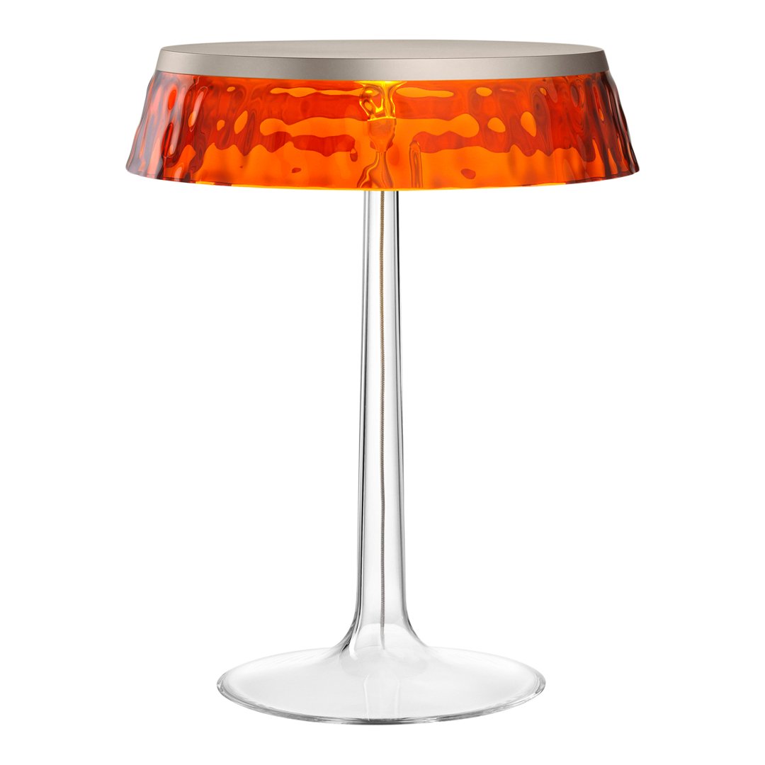 Orange textured shade with clear glass base, modern design, perfect for adding a pop of color to any space.