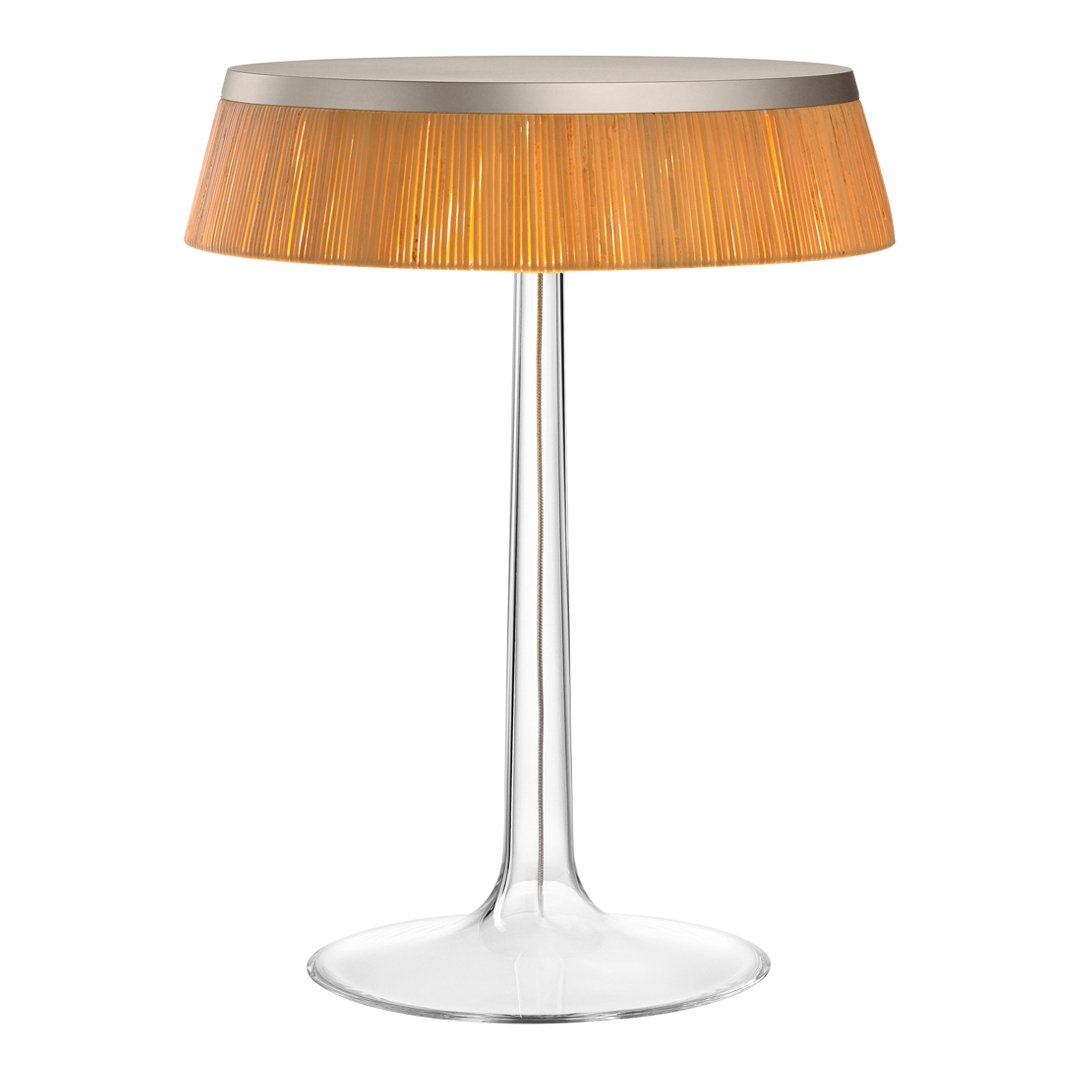 Modern table lamp featuring a sleek clear base and a vibrant orange shade with a textured pattern.