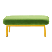 Green velvet bench with a smooth, rounded top and sleek yellow legs, perfect for modern decor.