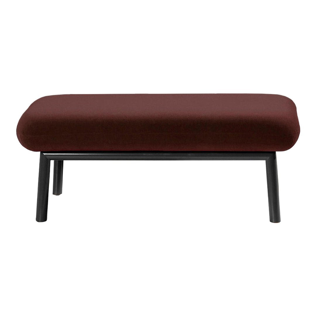 Burgundy velvet ottoman with smooth fabric and sleek black metal legs, perfect for modern decor.