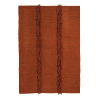 Rust-colored rug with textured fringe patterns, featuring two bold vertical stripes for a stylish touch.
