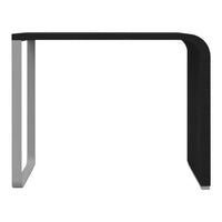 Sleek black and white table with a modern design and smooth, minimalist lines. Perfect for contemporary decor.