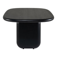 Stylish black table with a smooth, rounded top and cylindrical base, showcasing a modern minimalist design.