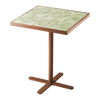 Green patterned tabletop with intricate designs and a brown metal base. Perfect for stylish outdoor or indoor settings.