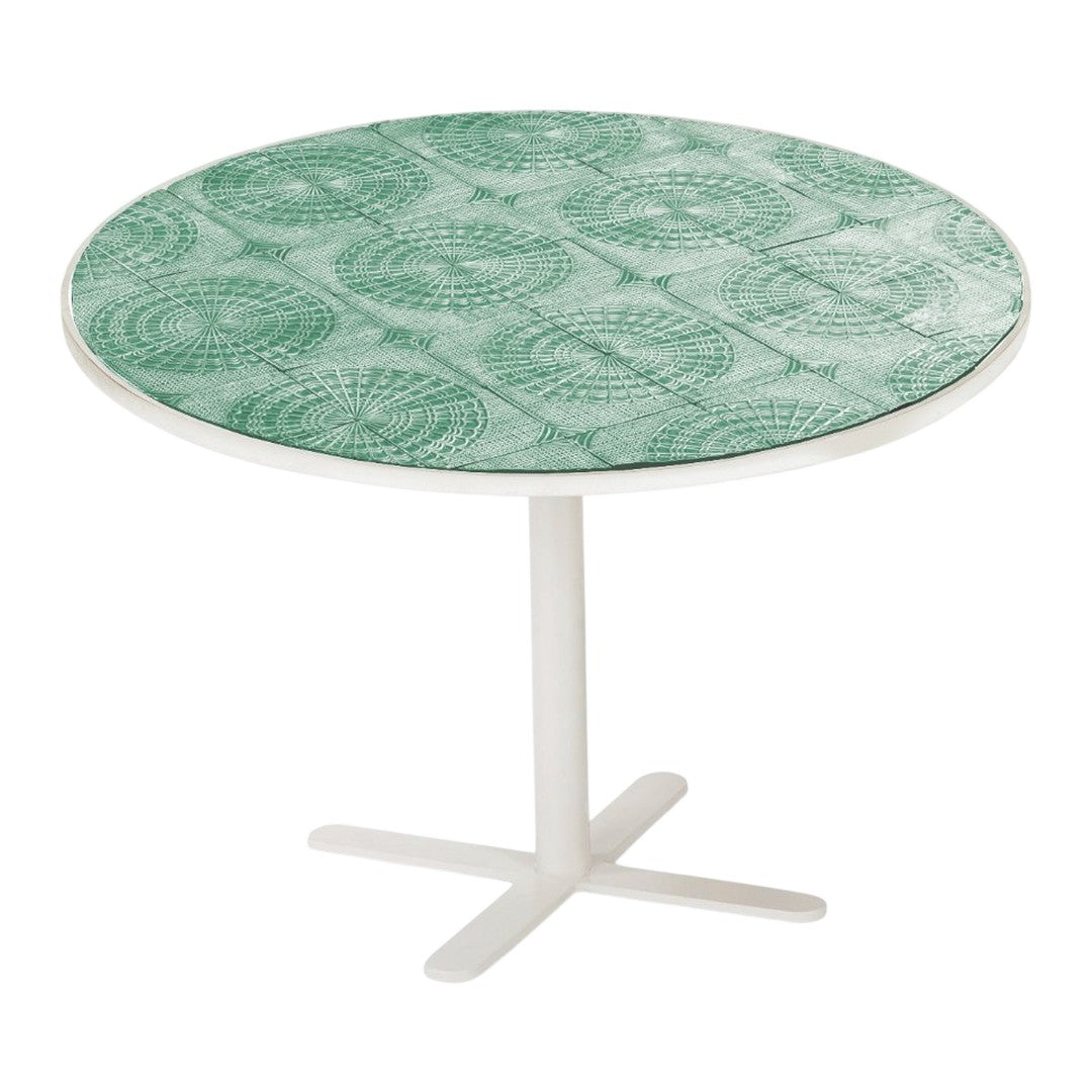 Round table with a mint green patterned top featuring circular designs and a white base. Ideal for stylish decor.