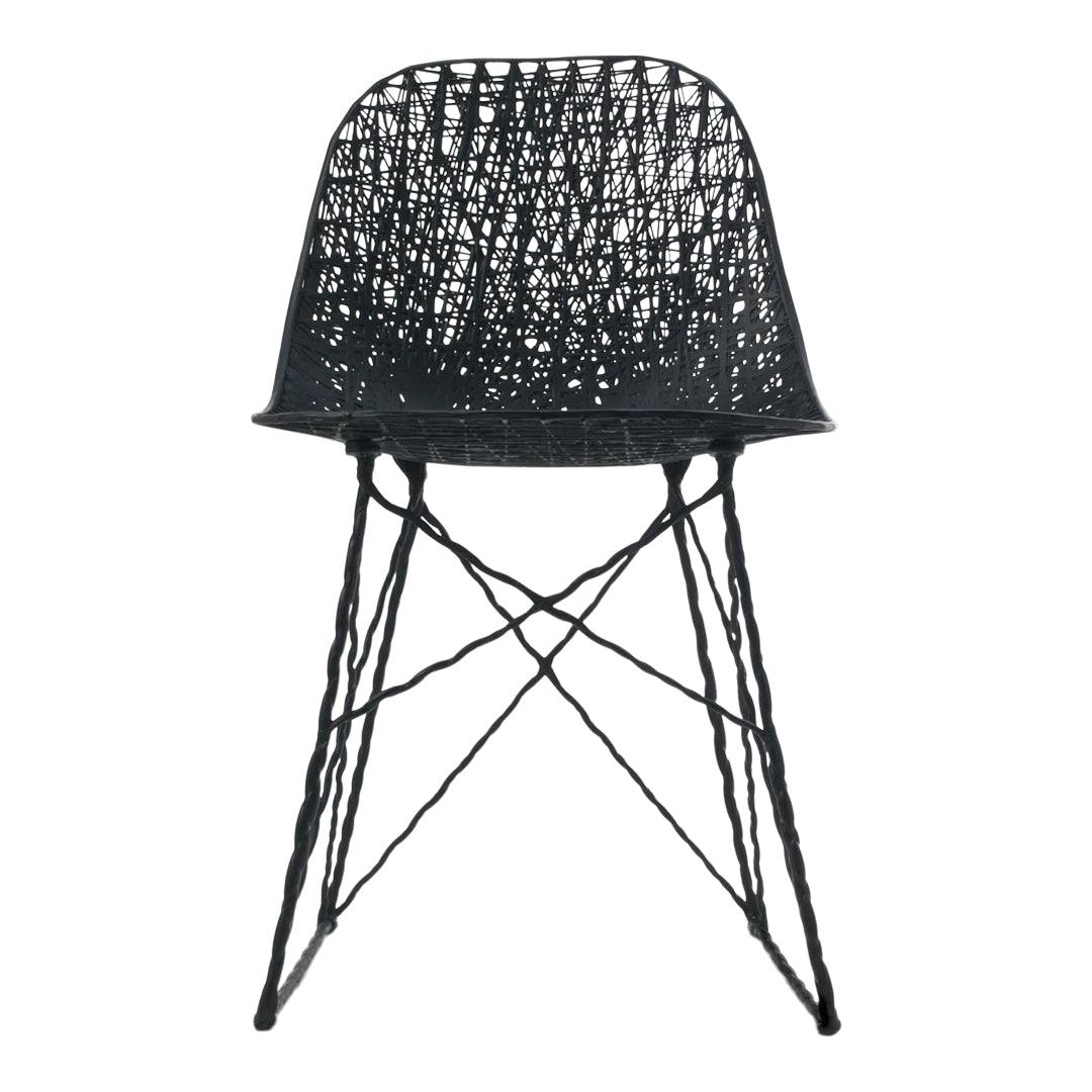 Black woven chair with a textured pattern and slender cross-legged base. Ideal for modern decor.