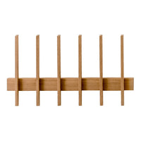Natural wood wall rack with six vertical slats, featuring a warm honey finish and sleek minimalist design.