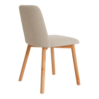 Beige fabric dining chair with smooth texture and light wooden legs, perfect for modern interiors.