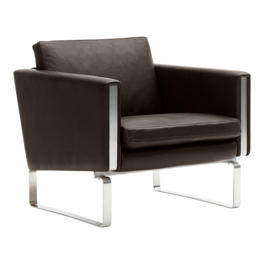Brown leather armchair with sleek chrome accents and minimalistic design. Perfect for modern decor.