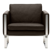 Dark brown leather armchair with sleek silver accents, featuring a minimalist design and smooth textures.