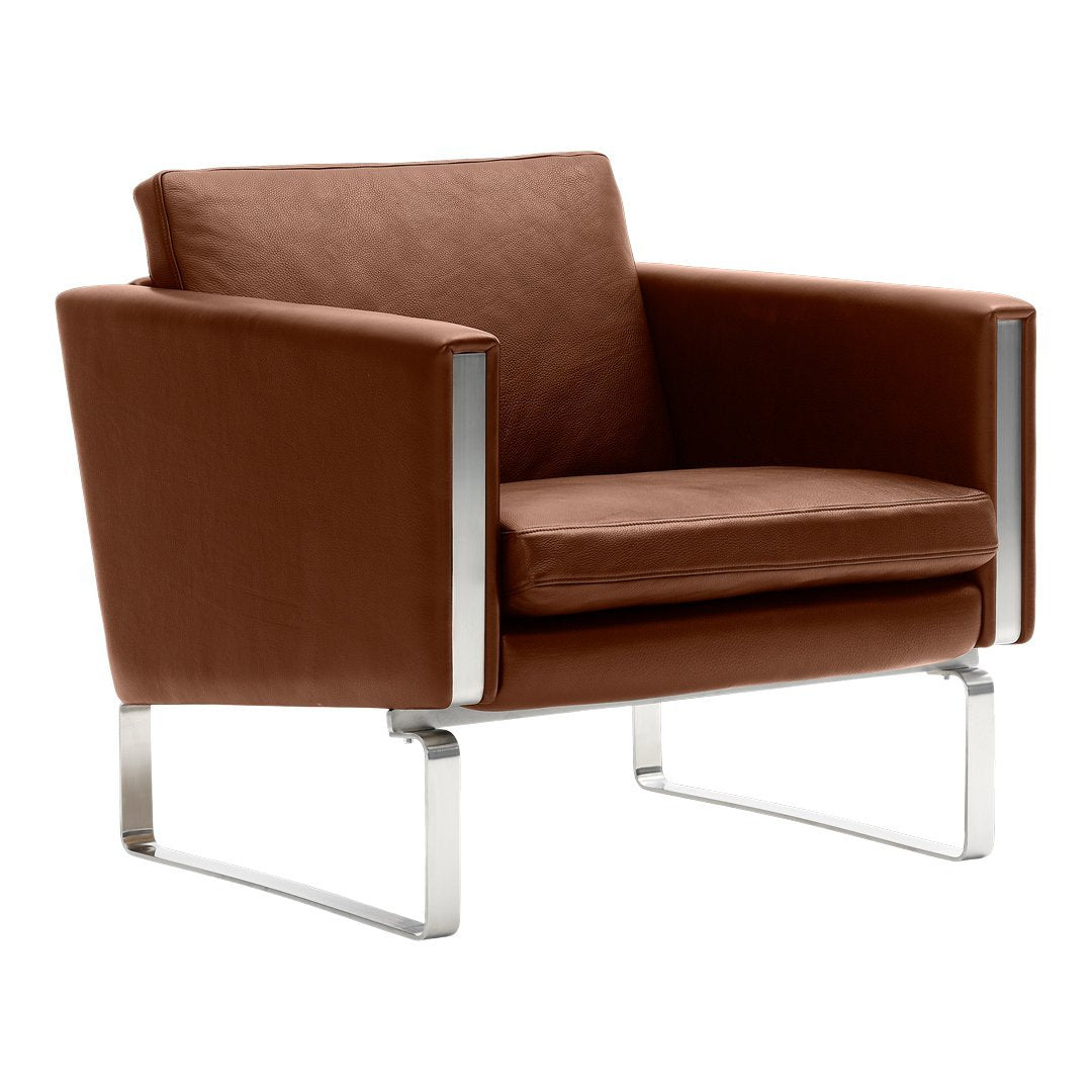 Brown fabric armchair with sleek chrome legs, offering a modern and minimalist design. Ideal for contemporary spaces.