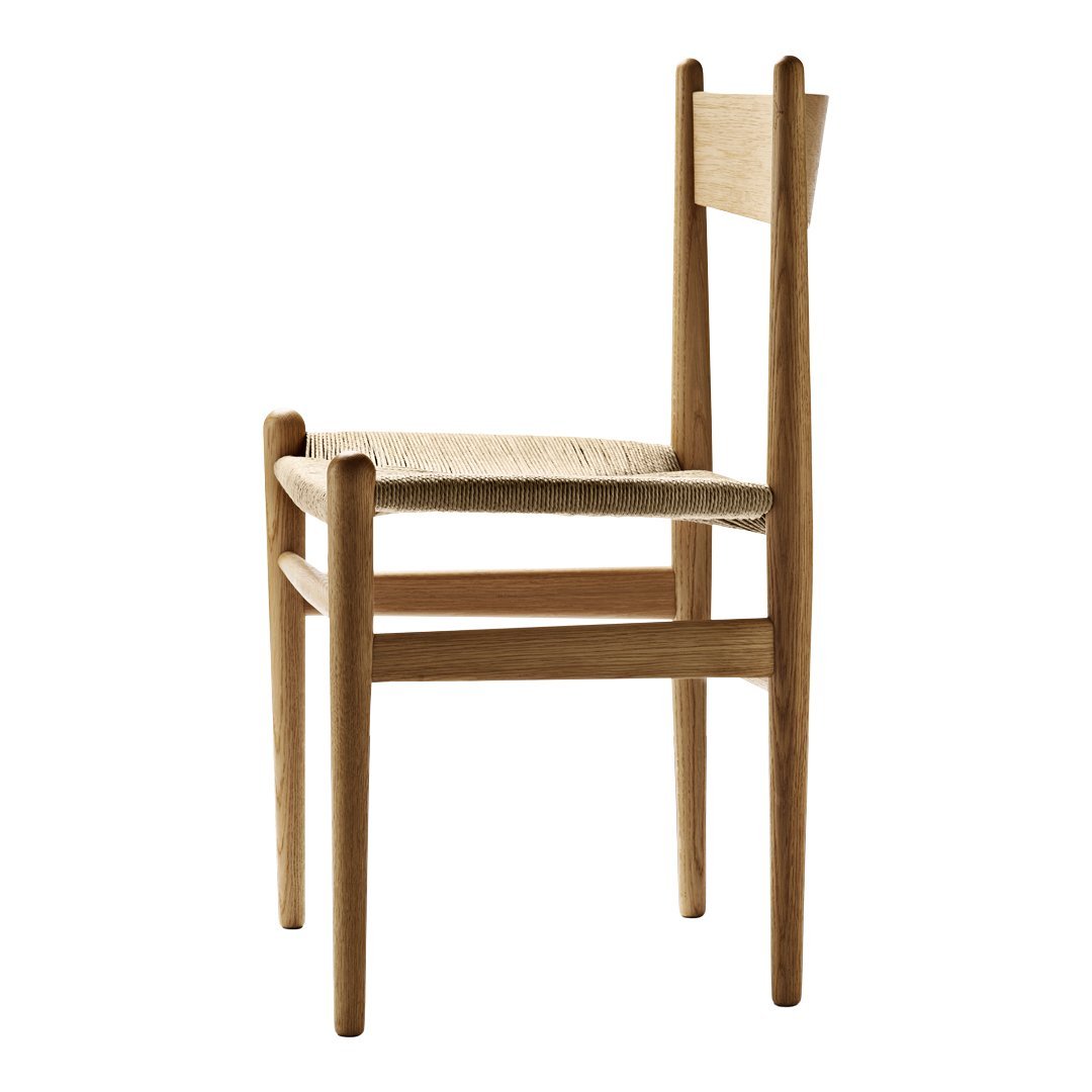Natural wood chair with a minimalist design and woven seat in light beige tones. Simple, elegant, and modern look.
