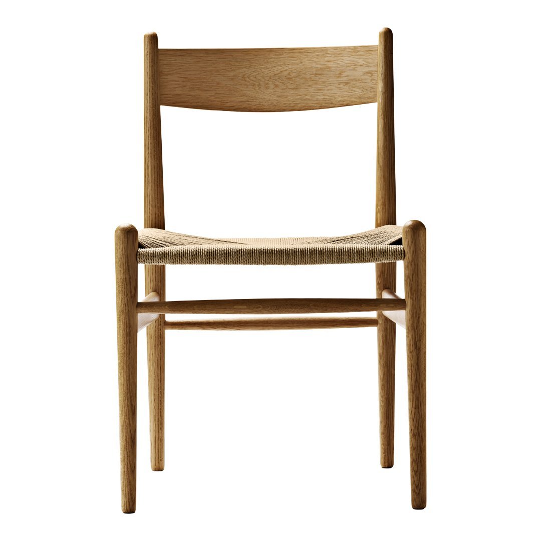 Natural wood chair with a light oak finish and woven beige seat. Minimalist design and clean lines for a modern aesthetic.