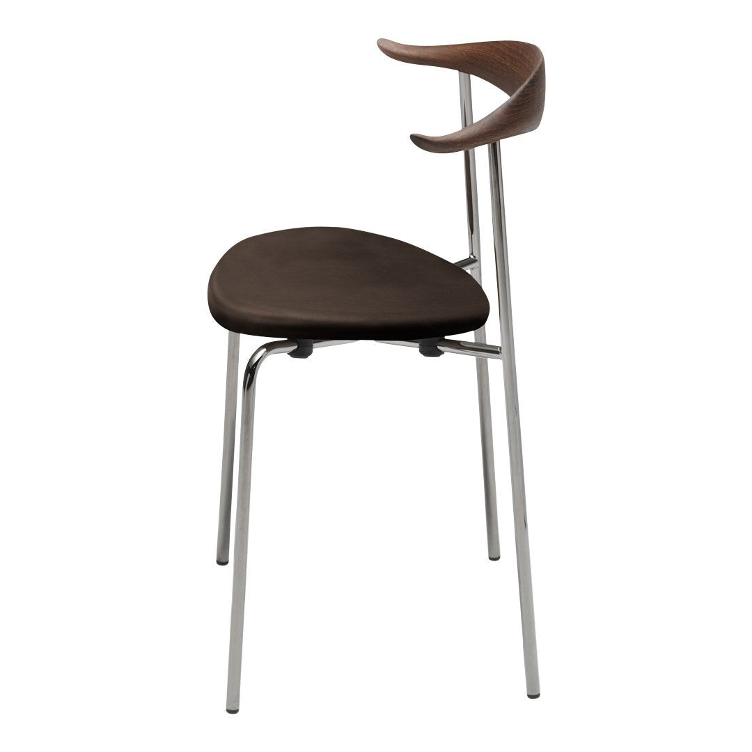 Brown upholstered chair with a sleek silver frame and curved wooden armrest, showcasing a modern design.