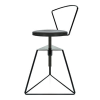 Black metal bar stool with a minimalist geometric design and sleek circular seat. Modern and stylish accent for any space.