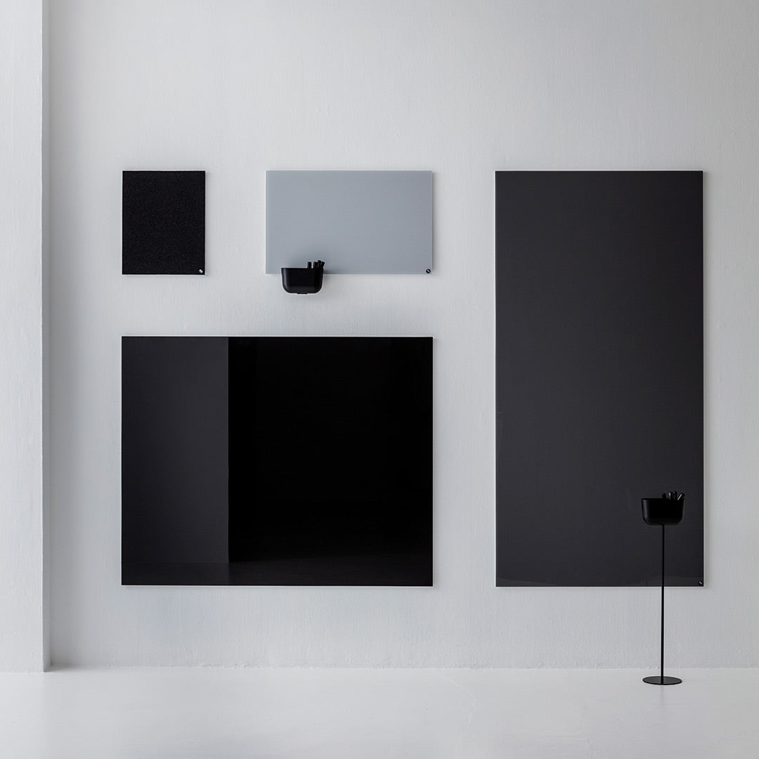 Set of modern wall panels in various shades of black and gray with sleek, minimalist design. Perfect for contemporary decor.
