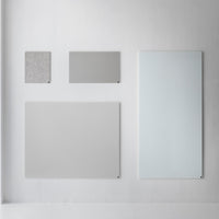 "Collection of grey panels in various textures and finishes, including smooth and textured designs, on a white backdrop."