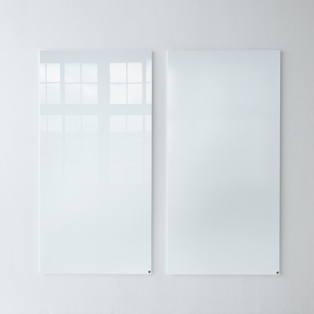 Two glossy white panels with a smooth surface, reflecting light against a neutral background. Perfect for modern decor.