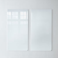 Glossy white wall panels with a sleek, reflective finish, featuring smooth surfaces and minimalistic design.