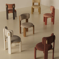Colorful chairs featuring warm tones like brown, beige, rust, and mustard with textured upholstery and minimalistic design.
