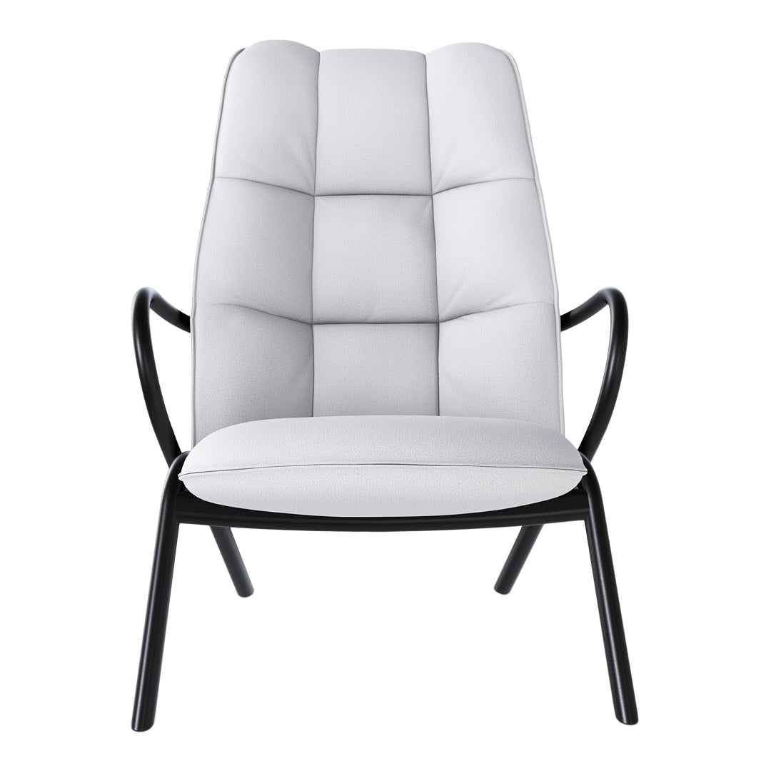 Modern chair featuring a soft white upholstery and sleek black metal frame with a quilted pattern.
