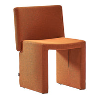 Modern orange chair with a textured weave pattern, ideal for stylish indoor decor.