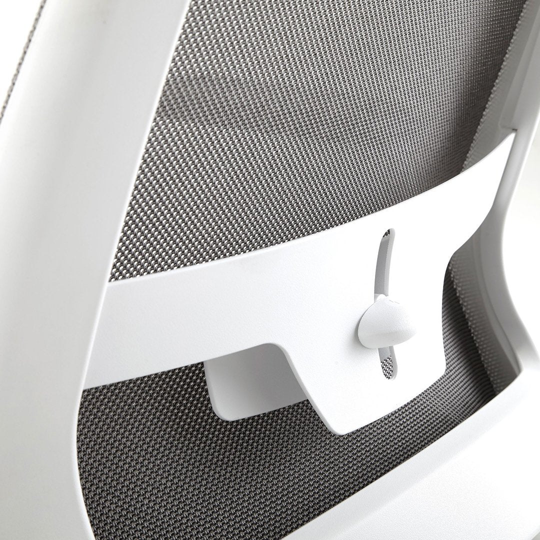 White ergonomic chair with a sleek mesh back, featuring a modern, minimalistic design and subtle gray patterns.