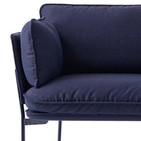 Navy blue fabric couch with plush cushions, featuring a smooth texture and contemporary design.