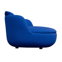 Vibrant blue upholstered chair with a smooth, minimalist design and rounded silhouette. Perfect for modern decor.