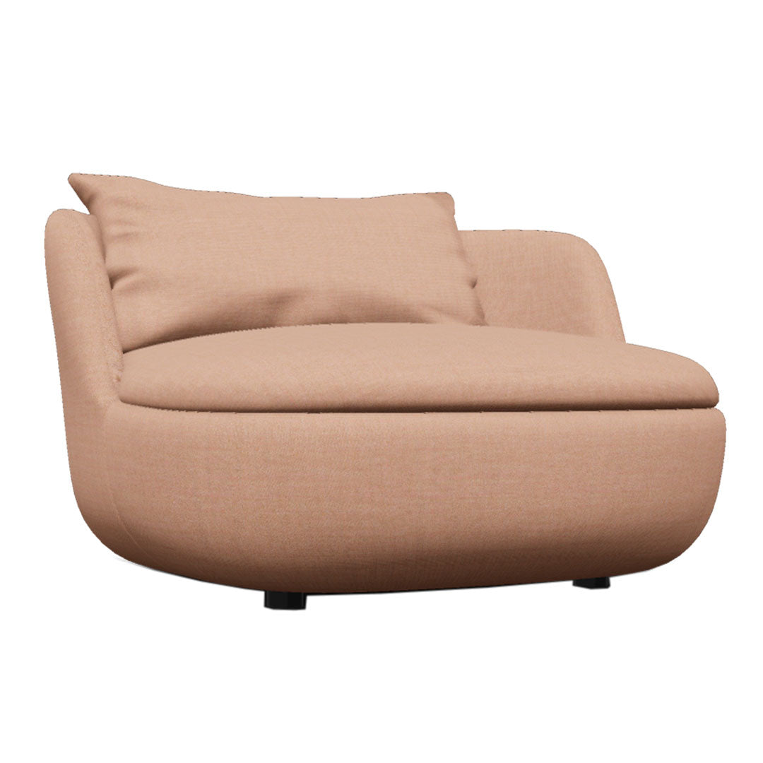 Peach-colored modern lounge chair with smooth fabric and a plush cushion, showcasing a simple and contemporary design.