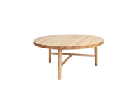 Round wooden coffee table in a natural oak finish, featuring a smooth surface and minimalist design.