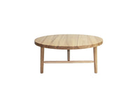Natural wood coffee table with a smooth light brown finish and minimalistic round design. Perfect for modern decor.