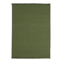 Solid dark green rug with fringe detailing, perfect for adding a touch of elegance to any space.
