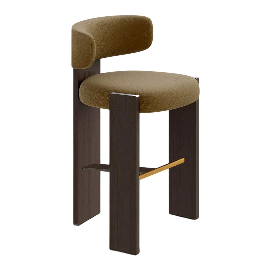 Brown upholstered stool with a minimalist design, featuring dark wood legs and a stylish gold accent bar.