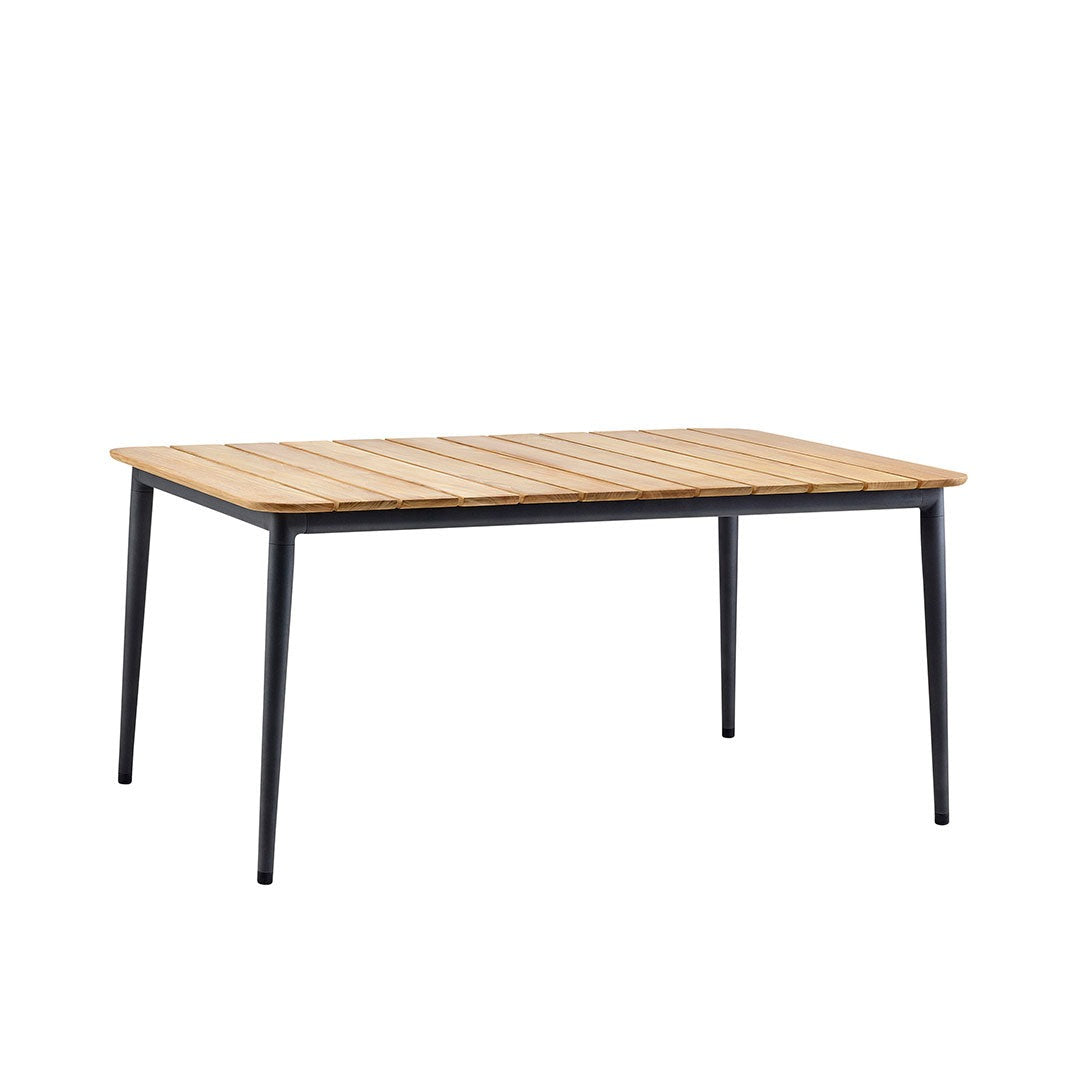 Light wood tabletop with horizontal slats, complemented by sleek black metal legs, perfect for modern dining setups.